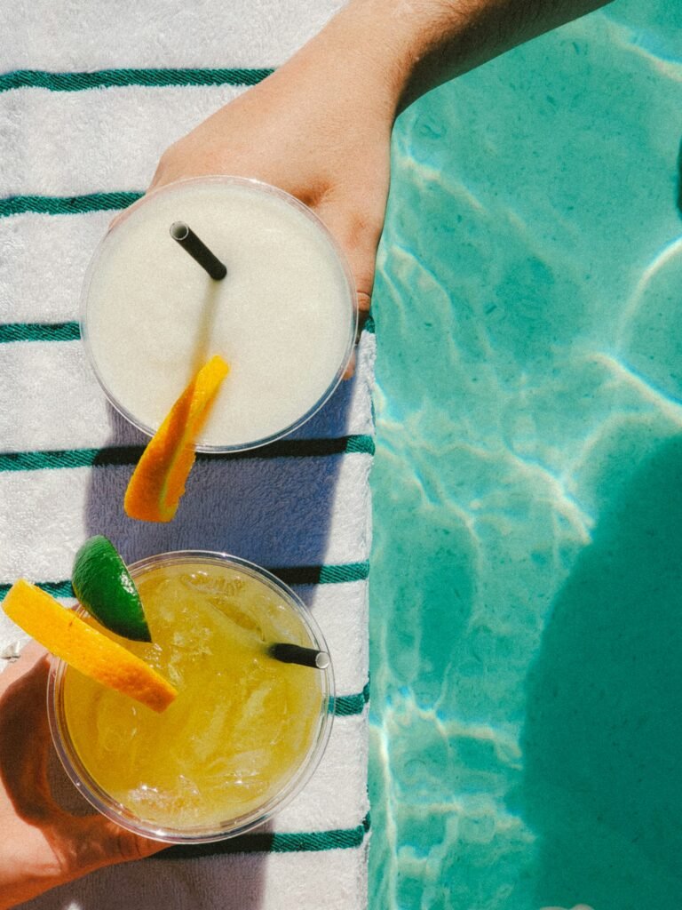 summer drinks by the pool sober socials spain
